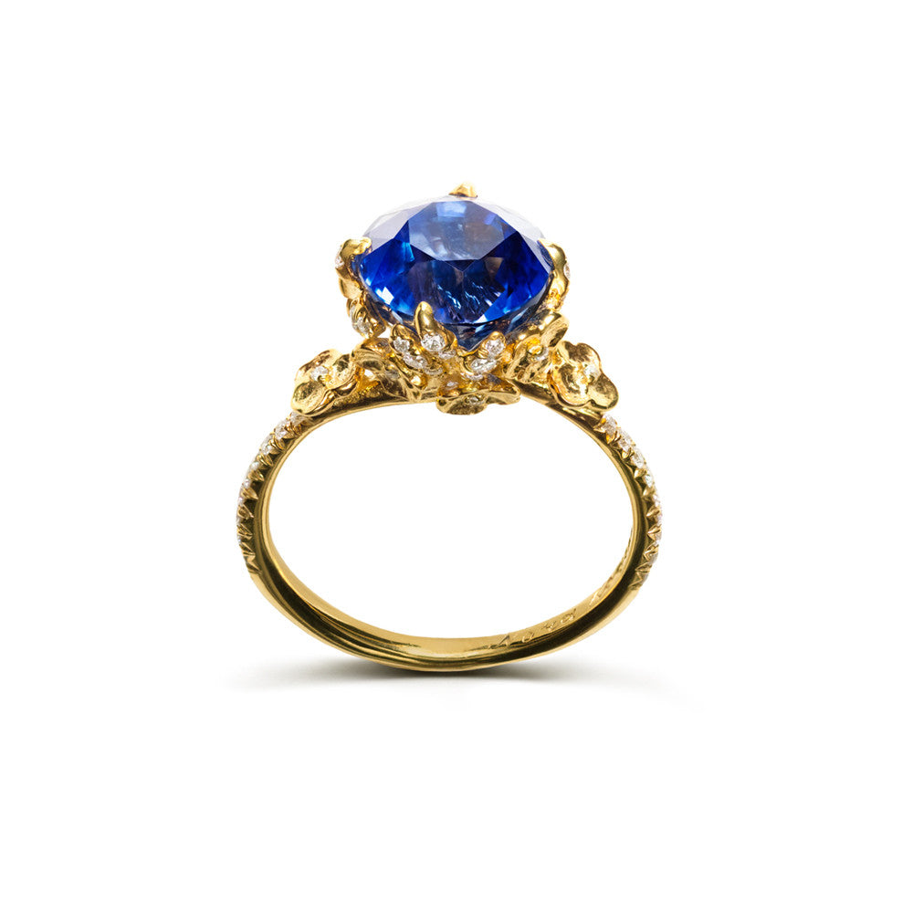 Unique designer heirloom sapphire and diamond engagement ring
