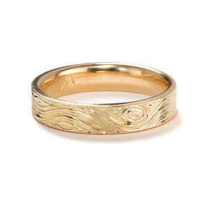 gold engraved band